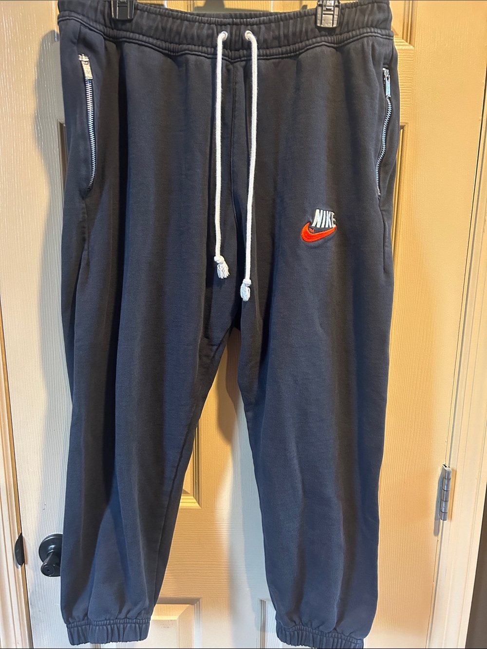 Nike men’s black Sweatpants with Red Swoosh